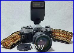 Canon AE-1 35mm Manual SLR Film Camera with 13.5-4.5 28-80mm Lense Macro Flash
