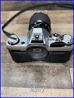 Canon AE-1 35mm SLR Film Camera Kalinar Haze 55MM Lens- Sunpak Bundle