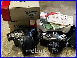Canon AE-1 35mm SLR Film Camera with 50mm Lens, Manuals, Case, OG Boxes And More