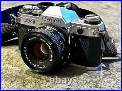 Canon AE-1 35mm SLR Film Camera with 50mm Lens, Manuals, Case, OG Boxes And More