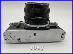 Canon AE-1 35mm SLR Film Camera with Canon 50mm f/1.8 FD Lens WORKING PERFECT
