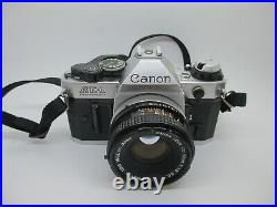 Canon AE-1 Program 35mm SLR Film Camera + 50mm 11.8 Canon Lens WORKING GREAT