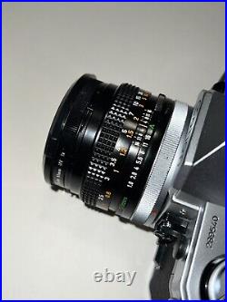 Canon AE-1 Program 35mm SLR Film Camera with 50mm f/1.8 FD Lens