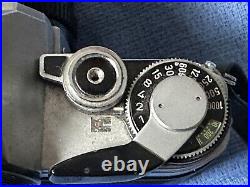 Canon AE-1 SLR 35mm Film Camera with Canon FD 50mm f/1.8 Lens & Sunpak Flash