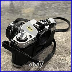 Canon AE-1 SLR Film Camera with Speedlite 133D Flash, 50mm Lens, & Quantaray Bag