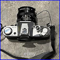 Canon AE-1 SLR Film Camera with Speedlite 133D Flash, 50mm Lens, & Quantaray Bag