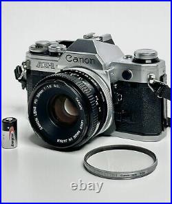 Canon AE-1 with 50mm 1.8 Lens 35mm Film SLR Camera With BATTERY TESTED WORKS