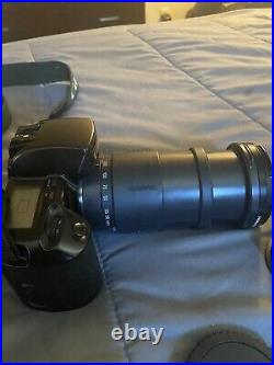 Canon EOS Elan 35mm SLR Film Camera. 3 Lenses Case, Strap See Pics