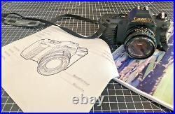 Canon T50 35mm Film SLR Camera w orig 50mm FD 118 Lens, Man, Strap & Batteries