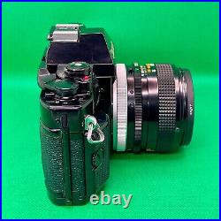 NEAR MINT Canon A-1 SLR Film Camera with lens FD 50mm F/1.4 S. S. C. Japan B002